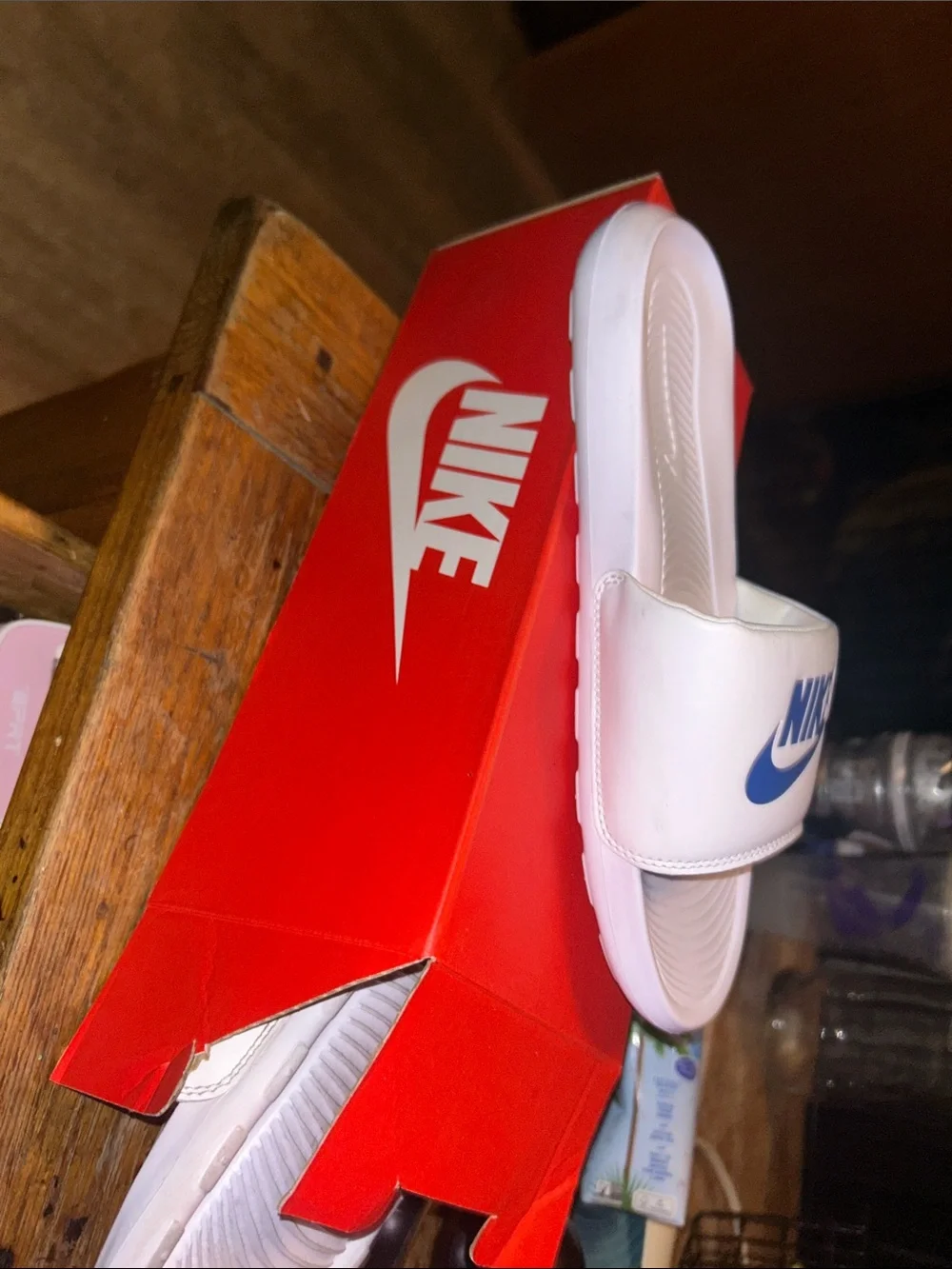 Nike White Slide Sandals with Blue Logo